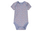 Un body bébé gris avec un motif de fleurs roses de Lupilu.