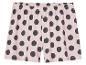 Shorts rose à pois noirs.