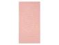 Serviette de bain rose pâle texturée.