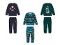Trois ensembles sweat-shirt et pantalon pour enfants avec des motifs de Noël.