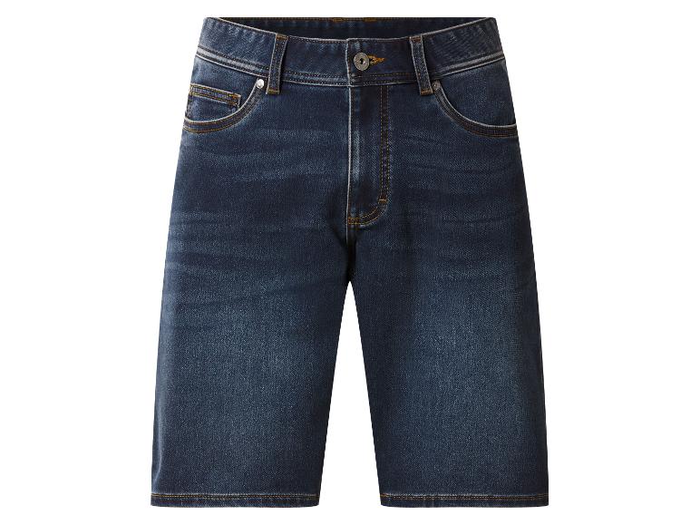 Short en jean bleu foncé avec surpiqûres oranges et détails métalliques.