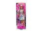 Poupée Barbie Pop Star aux cheveux violets et tenue argentée, dans son emballage.