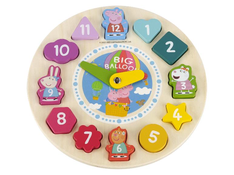 Un puzzle horloge en bois Peppa Pig avec des formes numérotées colorées.
