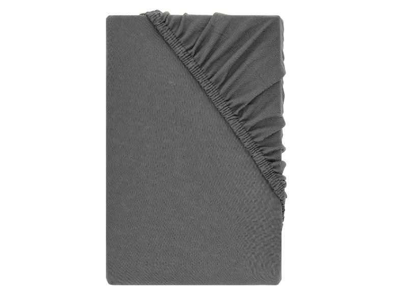 Drap-housse gris, plié