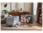 Parc pour bébé et lit de voyage LUPILU® dans un salon chaleureux avec un bambin