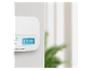 Moniteur de qualité de l'air blanc avec affichage numérique indiquant « 000 PPM ».