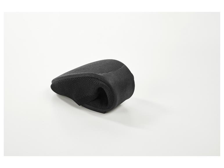 Coussin de siège noir avec texture en maille et rayures, plié