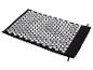 Tapis d'acupression noir avec points de massage blancs