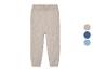 Pantalon en maille beige à motif losange.
