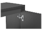 Charnières métalliques sur un meuble gris foncé.