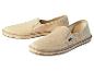 Deux paires de chaussures bateau beige en toile.