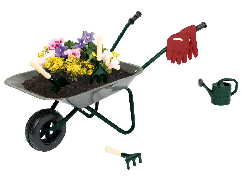 Brouette de jardin Parkside avec fleurs, outils, gants et arrosoir.
