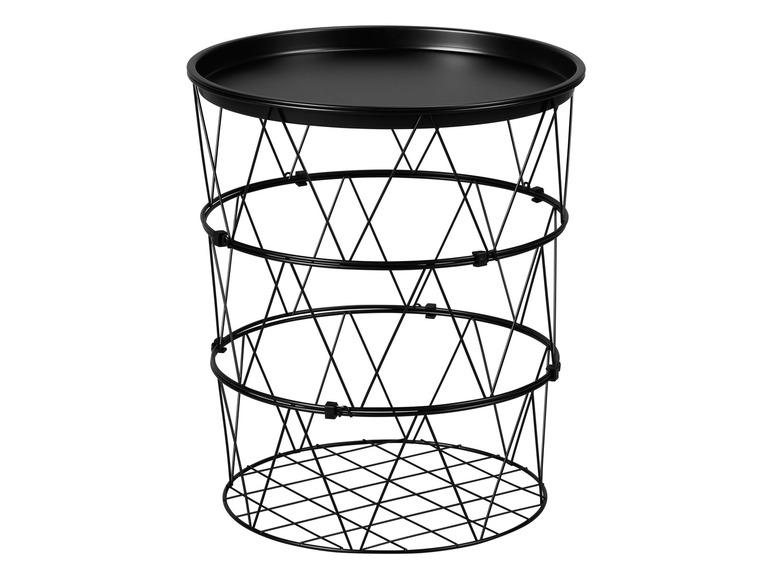 Une table basse en métal noir avec un plateau rond.