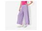 Pantalon large lilas et baskets blanches : look décontracté et stylé.