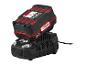 Un chargeur de batterie Parkside X20V Team noir avec une batterie rouge.