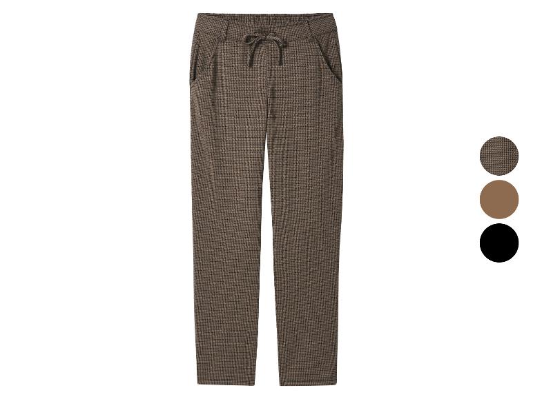Pantalon marron à motif pied-de-poule avec cordon de serrage à la taille.
