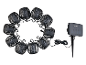 Guirlande solaire avec lanternes noires décorées, style fer forgé.