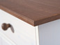 Une table de chevet en bois avec un plateau brun foncé et un tiroir blanc.