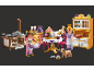 Jouet pour enfants avec poupées, cuisine et accessoires pour faire des gâteaux.