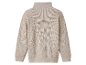 Pull beige à col roulé pour enfant.
