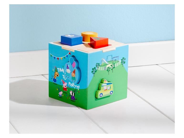 Jeu de blocs Peppa Pig avec un bus et des personnages.