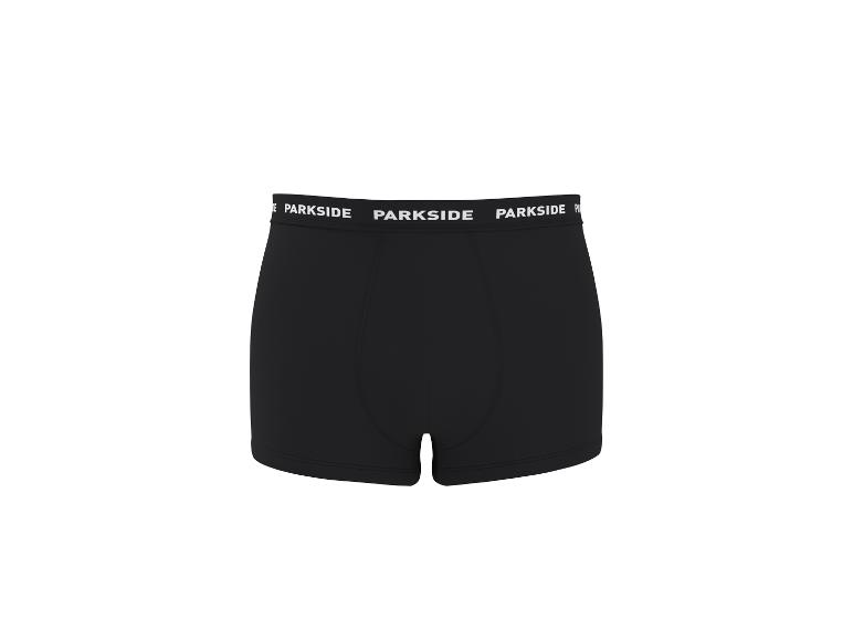 Caleçon boxer noir pour homme avec ceinture élastique blanche à texte répété.