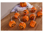 Guirlande lumineuse d'Halloween avec des formes de citrouilles