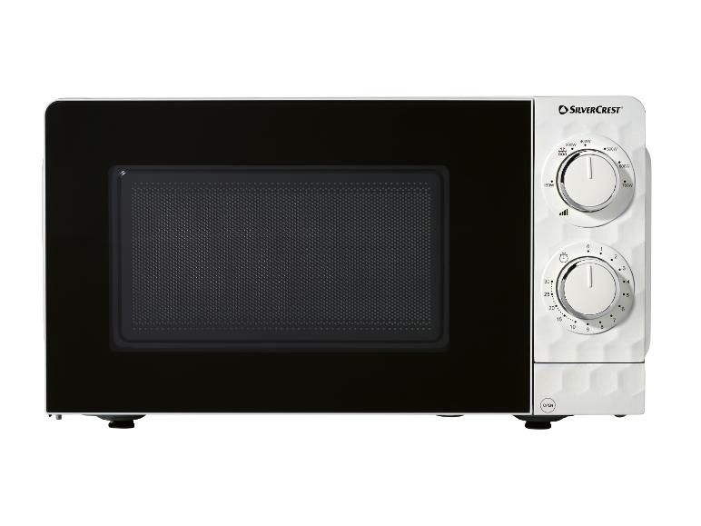 Micro-ondes blanc avec porte noire et deux boutons rotatifs