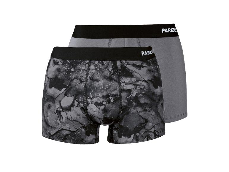 Deux boxers en coton pour homme, un gris et un avec un motif marbré gris.