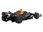 Une voiture de course de Formule 1 Red Bull noire et jaune avec le sponsor Oracle