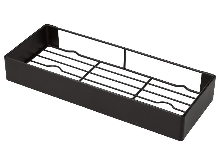 Étagère de douche rectangulaire noire en métal avec fond grillagé.