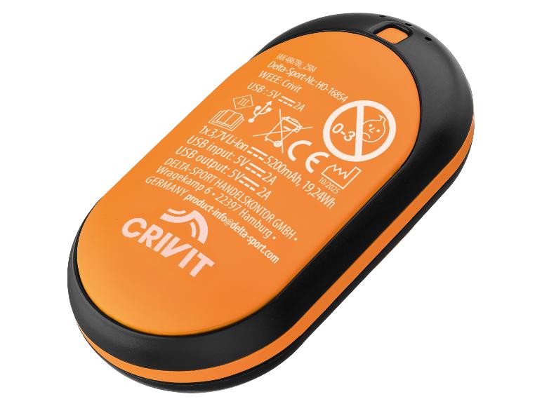 Batterie externe Crivit orange et noire avec informations produit et symboles de sécurité.