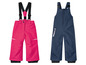 Deux paires de pantalons de ski pour enfants, un rose et un bleu marine.