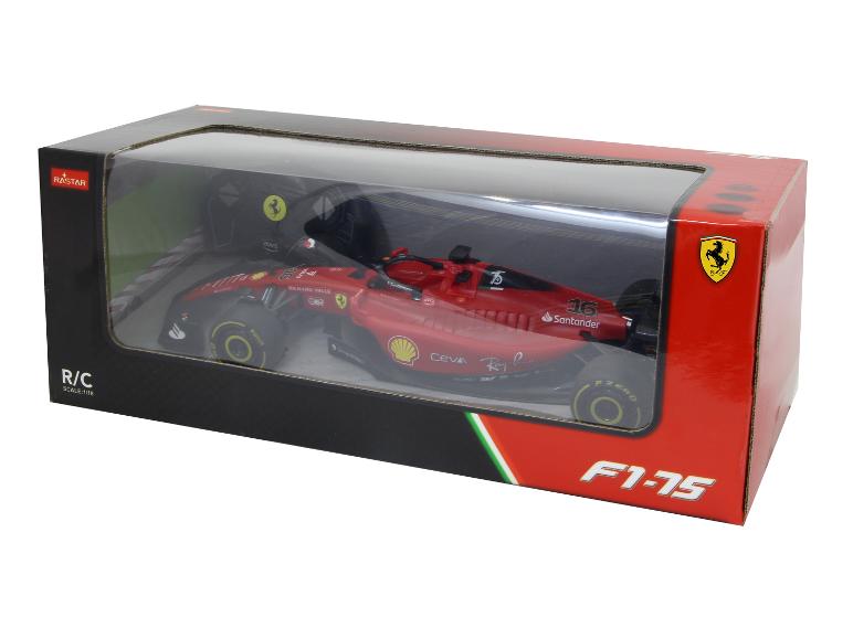 Une voiture de course Ferrari F1-75 rouge de Rastar dans une boîte.