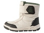 Bottes imperméables beige avec semelle noire.