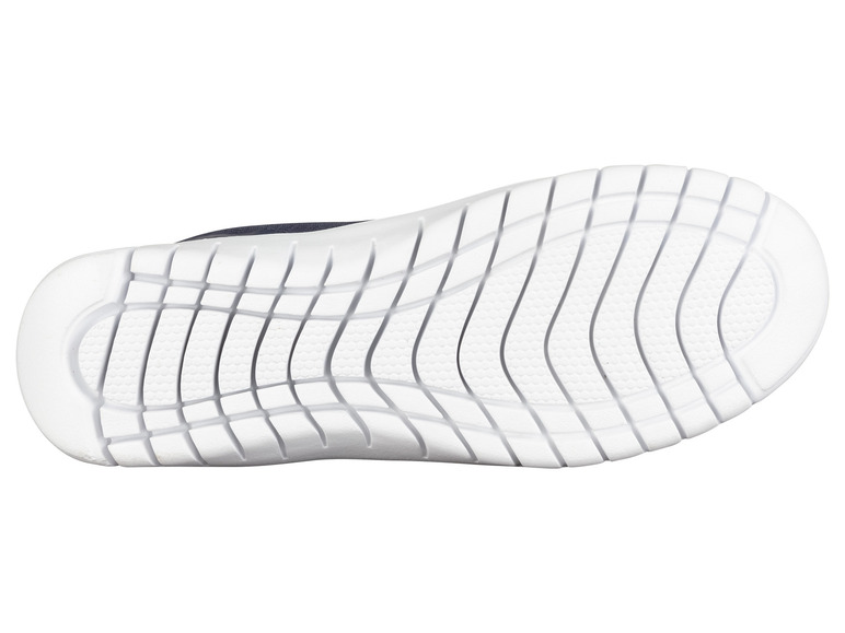 Semelle blanche d'une basket marine.