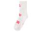 Chaussettes blanches pour enfants avec empreintes de pattes roses et texte « PAW PATROL »