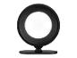 Un miroir rond noir avec un pied