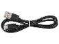 Câble noir USB-A vers USB-C, enroulé et attaché avec un lien blanc