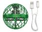 Orbe volant vert avec hélices et câble de chargement USB blanc.