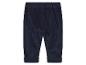 Pantalon en velours côtelé bleu marine pour bébé.