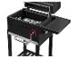 Un barbecue Grillmeister noir avec le couvercle ouvert, du charbon et une table latérale.