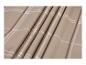 Tissu à carreaux beige, marron et blanc.