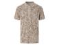 Polo beige à motif feuilles tropicales.