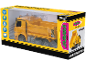 Camion-benne jouet jaune radiocommandé dans sa boîte.