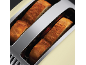Deux tranches de pain grillent dans un grille-pain.