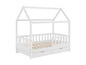 Lit enfant blanc avec toit en forme de maison et tiroirs.