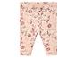 Leggings beiges avec un imprimé Winnie l'ourson et un motif floral.