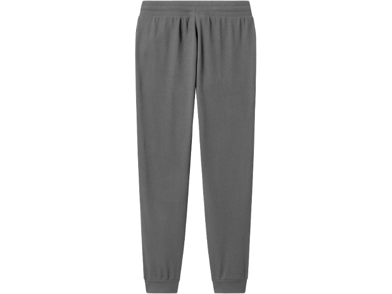 Pantalon de survêtement noir avec taille élastique et poignets côtelés.