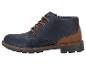 Bottes d'hiver homme bleu marine avec accents marron et lacets.